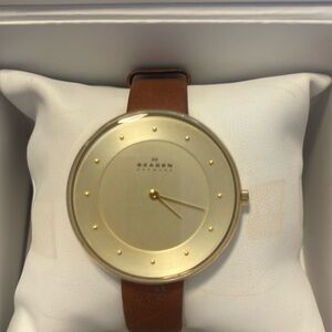 Skagen gold faced leather watch